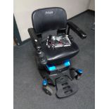 A Pride mobility Go chair with charger