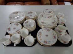 Two trays containing seventy-three pieces of Minton Marlow china tea and dinner ware