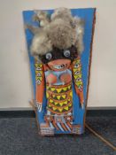 A 20th century hand painted Hopi style figure on wooden board signed G Rethe 67