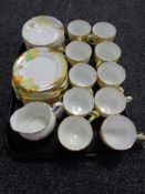 Thirty two pieces of Grafton hand painted tea china