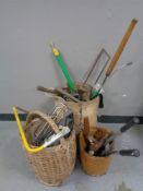 Three baskets of assorted garden tools, hand tools,