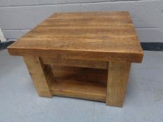 A square reclaimed pine coffee table