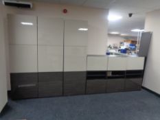An Ikea high gloss triple door cabinet and a matching entertainment stand