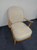 An Ercol beech Windsor easy armchair