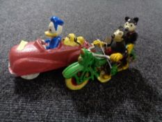 Two cast iron figures - Duck and Mickey Mouse