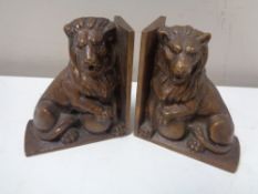 A pair of bronze lion bookends,