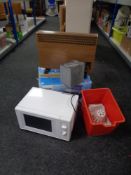 A microwave oven, boxed Epson printer,