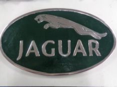 A large aluminium Jaguar plaque