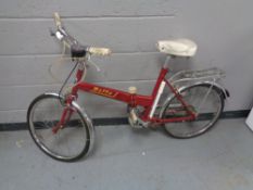 A twentieth century folding Delta bike with speedometer