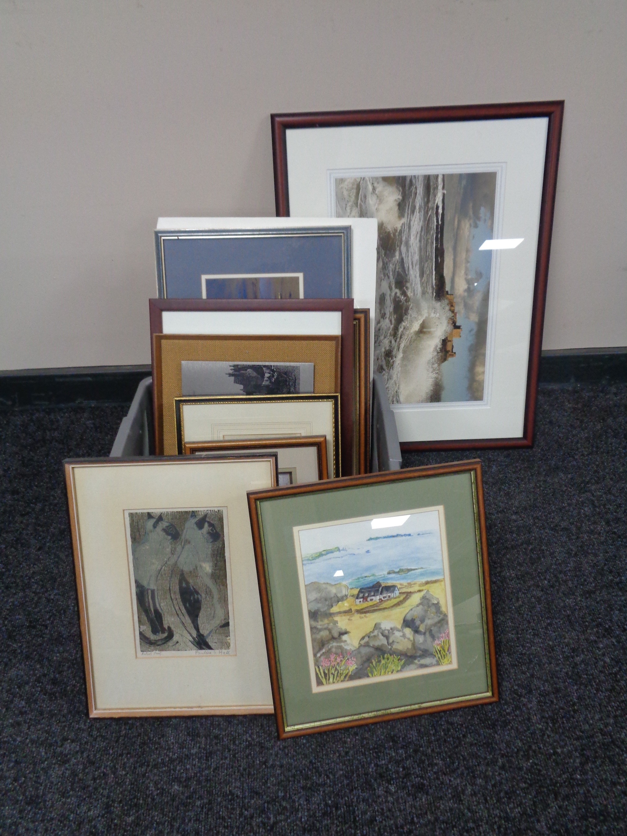 A box of assorted pictures and prints, framed photograph of Bamburgh Castle,