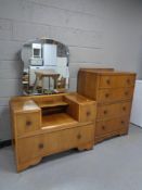 A mid 20th century walnut four drawer chest and sunk centre dressing chest