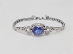 A 14ct white gold tanzanite and diamond Art Deco style bracelet,