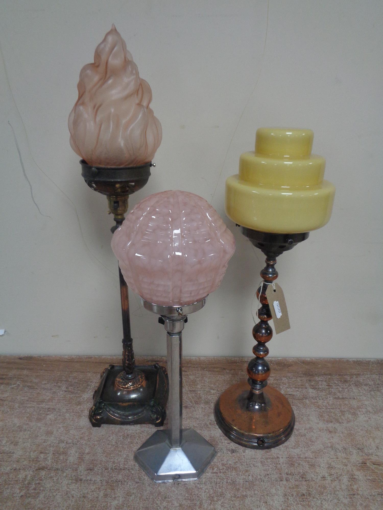 Three Art Deco table lamps with coloured glass shades CONDITION REPORT: The yellow