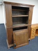 A 19th century continental oak double door pantry cupboard (a/f)