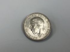 A 1928 one florin coin