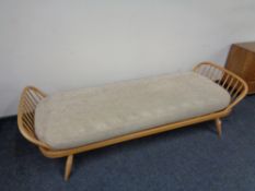 An Ercol solid elm and beech studio day bed, catalogue no.