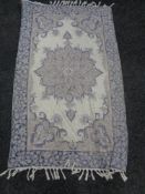 A fringed chain stitch rug,