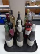 A tray of twelve assorted bottles of wine - shiraz, merlot,