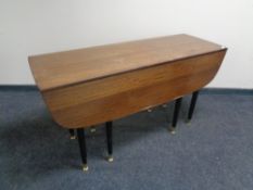 A 20th century teak G-plan drop leaf table