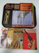 A tray of leather pouch containing tin of air rifle pellets, further box of pellets,