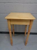 A pine stripped occasional table