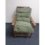 An early 20th century beech framed adjustable armchair
