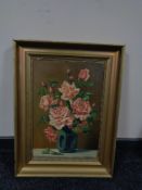 A 20th century continental school oil on canvas, still life of pink roses in a vase,