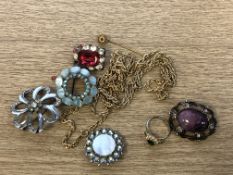 An antique stick pin together with costume brooches, ring,