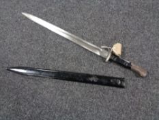 An unmarked bayonet in sheath