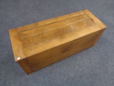 A 20th century oak blanket box