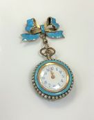 An early twentieth century silver and enamelled Swiss fob watch, cylinder movement with white dial,