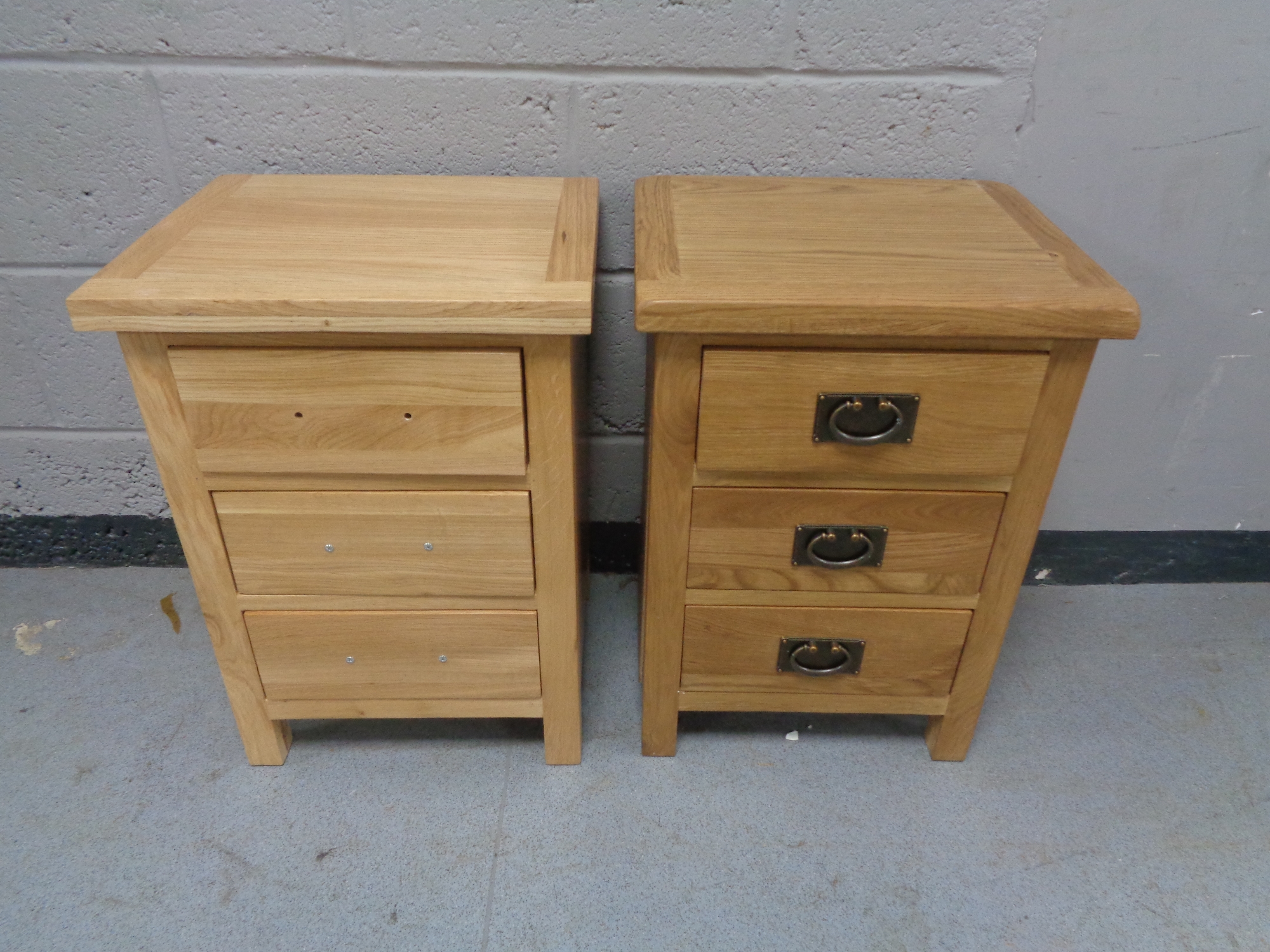 Two contemporary three drawer bedside chests (one missing handle)