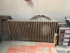 An antique cast iron radiator - 1480 mm x 770 mm.