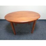 A 20th century oval teak occasional table