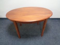 A 20th century oval teak occasional table