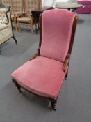 A Victorian mahogany lady's chair in pink dralon