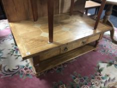 A Barker & Stonehouse coffee table with undershelf with travertine inlay
