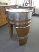 An oil drum bar table