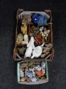 Two boxes of assorted elephant ornaments