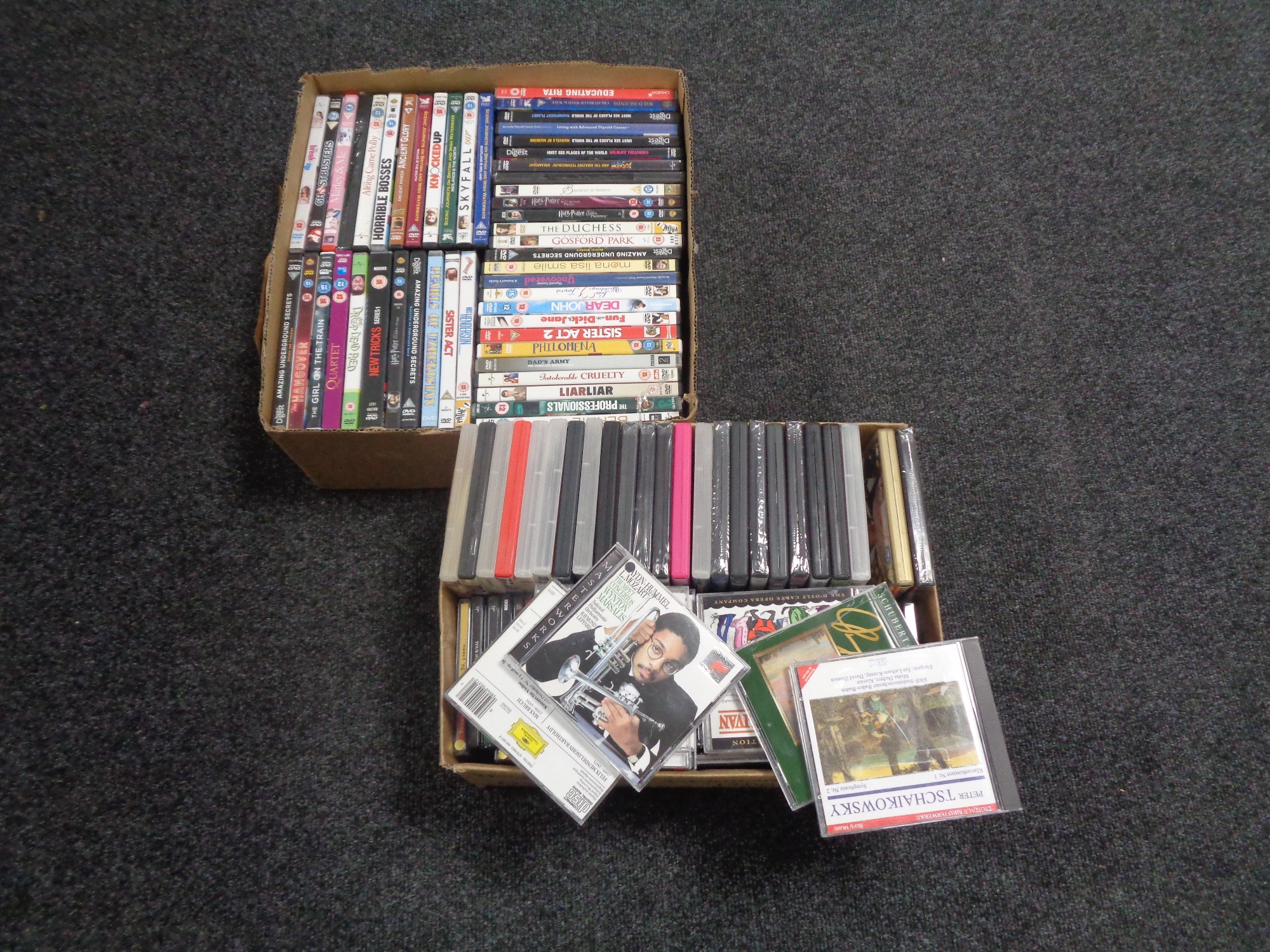 Two boxes of DVD's and CD's