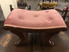 An Edwardian footstool in pink dralon