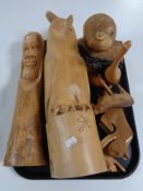 A tray of wooden carvings including three by D Reynolds, owl,