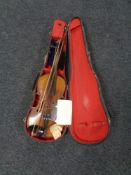 A Stradivarius copy violin with bow in fitted case CONDITION REPORT: Back length