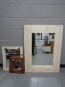 Three rustic pine framed mirrors