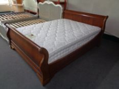 A 5' sleigh bed in mahogany finish together with a sweet dreams Glenville Otho interior