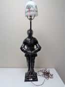 An early twentieth century lamp in the form of a knight