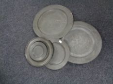 Five antique pewter plates