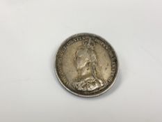 An 1887 enamel shilling