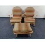 A pair of Ercol solid elm and beech Windsor double-bow easy chairs, catalogue no.