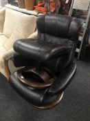 A brown leather swivel adjustable chair with stool (a/f) CONDITION REPORT: Arm needs